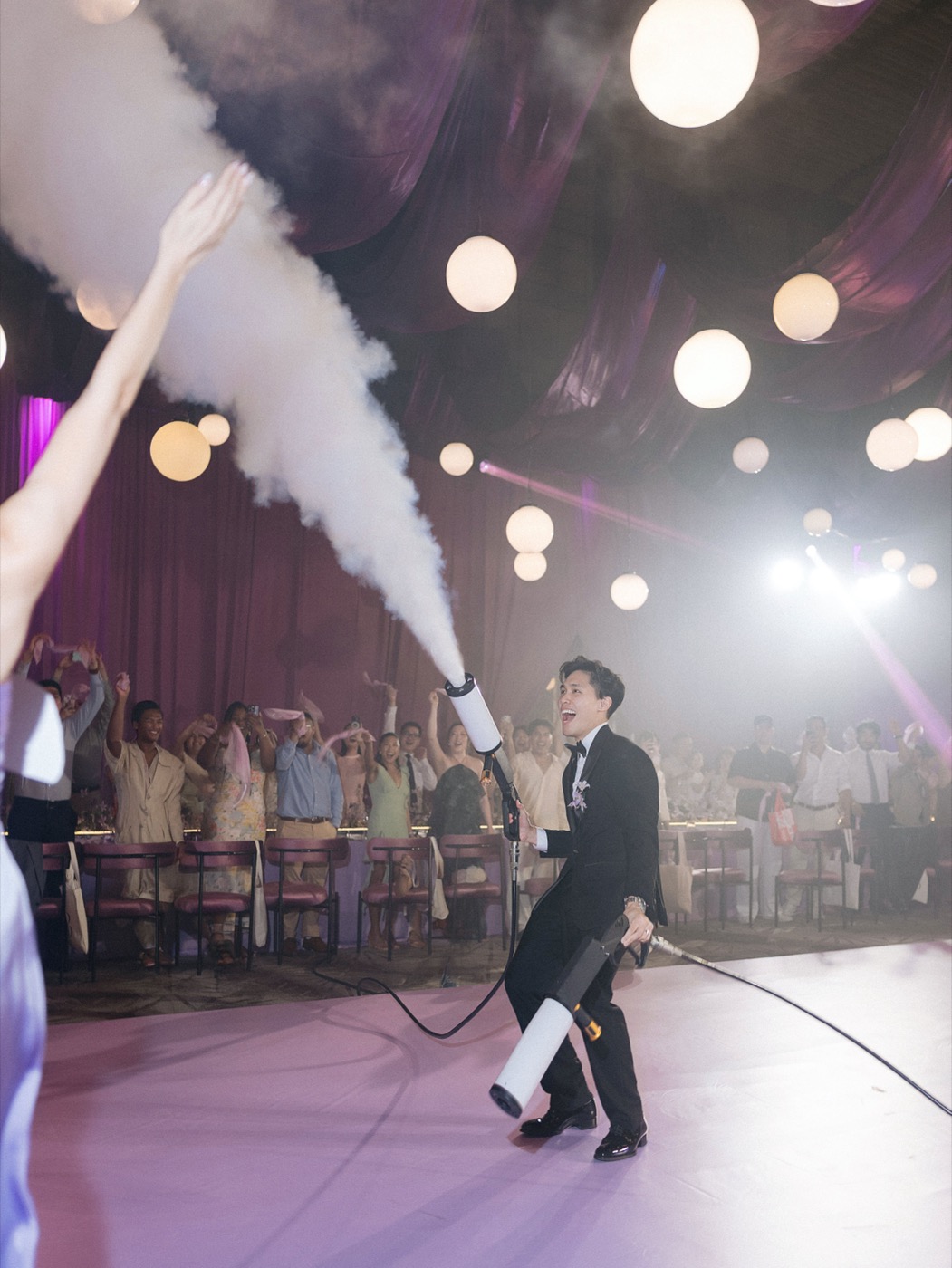 CO2 blast over a cheering crowd